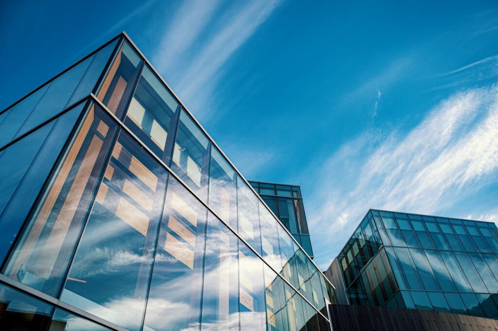 Low Angle Photo of Glass Buildings